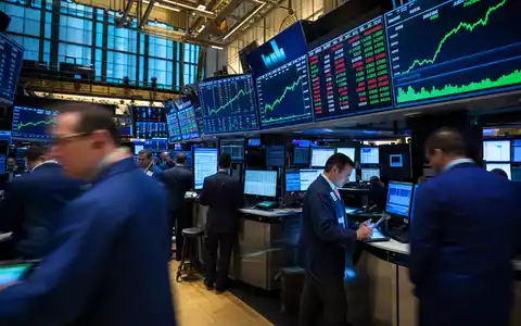 GoDaddy Inc. Aktien am NYSE Handelsparkett mit Tech Sektor Charts, ISIN US3802371076 - Foto: THN