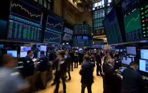 Healthpeak Properties US42226K1051 zeigt NYSE-Tradingfloor mit Healthcare-REIT-Kursdiagrammen und aktiven Händlern in Bewegungsunschärfe - Foto: THN