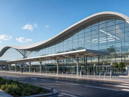 Modernes Architektur-Render eines Flughafenterminals veranschaulicht Infrastruktur der Deutsche Lufthansa AG, ISIN DE0008232125, Betrieb - Foto: THN
