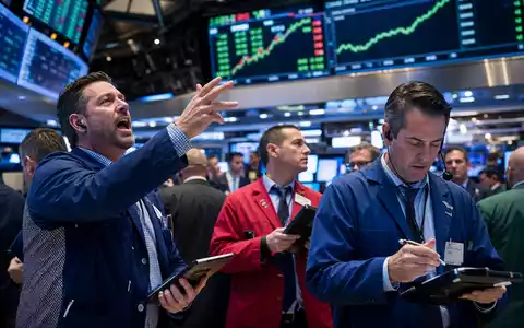 IDEX Corporation US45167R1041 – Börsenhändler an der NYSE mit steigendem Industriesektor-Chart auf Screens - Foto: THN