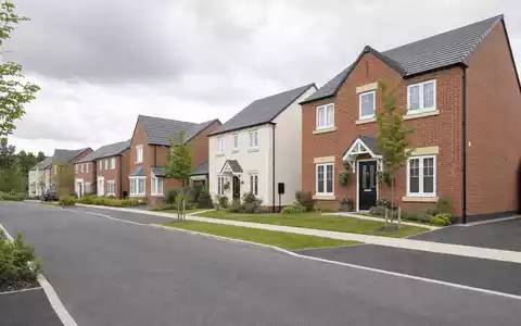 Fotorealistische britische Neubau-Siedlung zeigt Persimmon plc GB0030927254 im Wohnungsbau-Sektor mit typischen Backsteinhäusern - Foto: THN