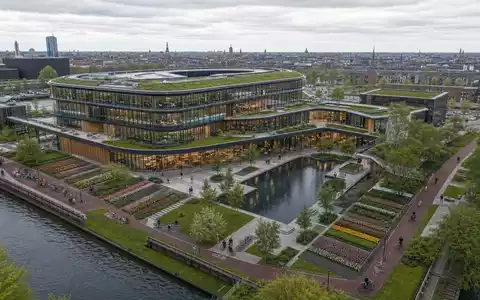 Adyen N.V. NL0012969182 Architektur Render Fintech Campus Amsterdam Glas Gebäude Dachgarten Tulpen - Foto: THN