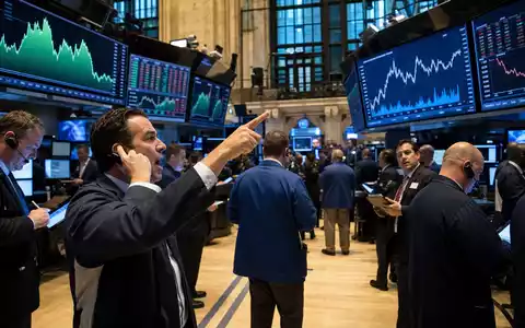Loews Corporation US5404241031 dokumentiert Börsen-Editorial mit Händlern und Charts auf geschäftigem NYSE-Handelsparkett - Foto: THN
