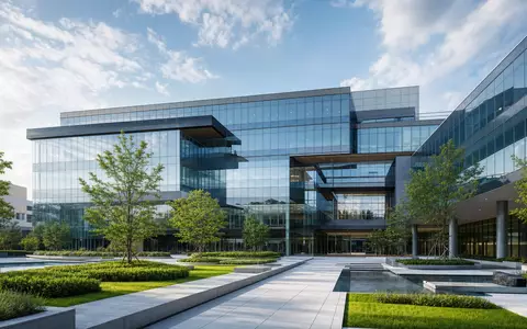Modernes Architektur-Rendering eines Glas-Bürokomplexes repräsentiert Unternehmenszentrale von TE Connectivity Ltd. (CH0102993182) mit begrüntem Vorplatz - Foto: THN