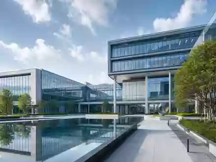 Teledyne Technologies (US8793601050) präsentiert als Architektur-Render eines modernen Glas-Forschungsgebäudes mit ruhigem Wasserbecken und Grünflächen - Foto: THN