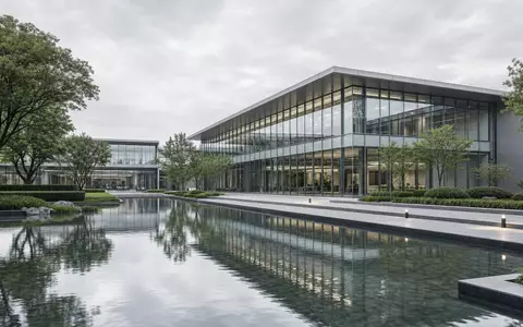 Altria Group Inc. US02209S1033 – CGI-Render eines modernen Konzern-Hauptquartiers mit Spiegelteich davor - Foto: THN
