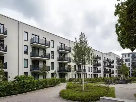 LEG Immobilien SE (DE000LEG1110) verwaltet moderne Wohnsiedlungen mit Balkonen und gepflegten Grünanlagen in Städten - Foto: THN