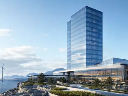 Equinor ASA (NO0010096985) betreibt moderne Bürogebäude, hier als futuristisches Glas-Hochhaus an nordischer Küste gerendert - Foto: THN