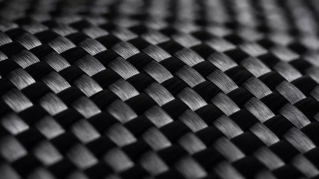 Extreme Nahaufnahme einer gewebten Kohlefaser-Verbundmaterial-Textur