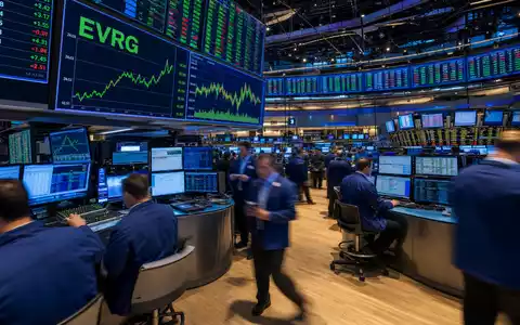 Evergy US30034W1064 EVRG-Ticker leuchtet hell auf Handelsboden-Bildschirm umgeben von aktiven Tradern und Stromversorger-Charts - Foto: THN
