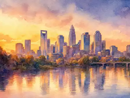 Albemarle Corp. US0126531013 – Aquarell der Charlotte North Carolina Skyline bei goldenem Abendlicht mit Flussreflexionen - Foto: THN