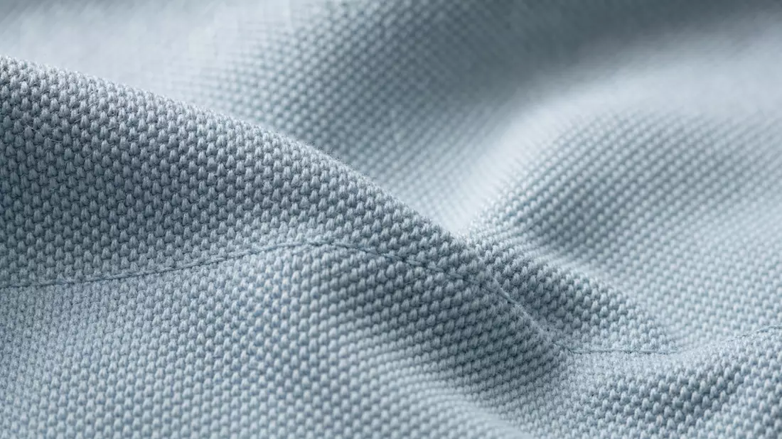 Extreme Nahaufnahme von gewebtem Baumwollstoff mit sichtbarer Textur