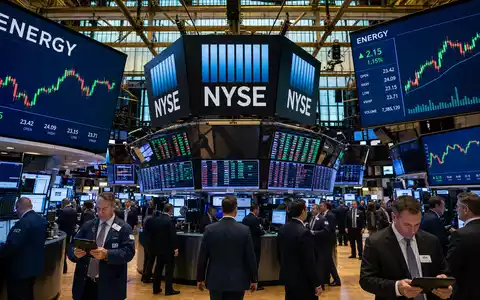 Valero Energy Corp US91913Y1001 zeigt den NYSE-Handelssaal mit Energie-Sektor-Kurscharts auf großen Bildschirmen lebhaft - Foto: THN