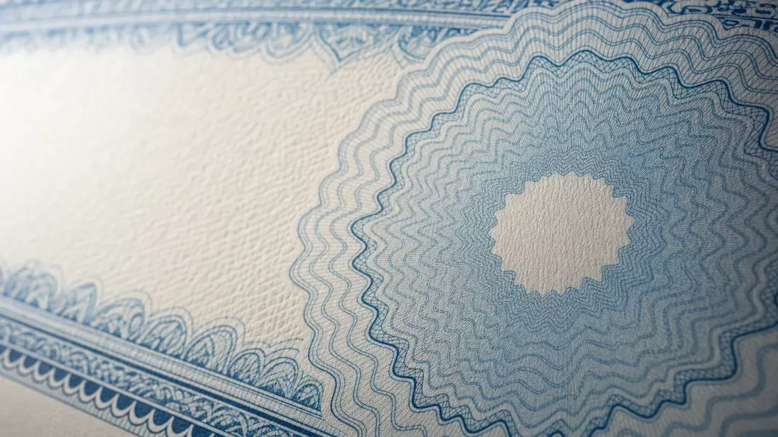 Makrofotografie Guilloche-Sicherheitsmuster Wertpapierpapier blau weiß