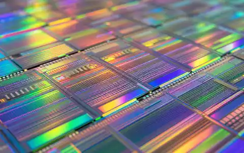 Makroaufnahme zeigt Halbleiter-Detailstruktur passend zu KLA Corporation ISIN US4824801009 mit schillernden Chip-Mustern - Foto: THN