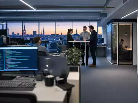 Fotorealistische Bürowelt zeigt Softwareentwicklung bei Nagarro SE, ISIN DE000A3H2200, moderne IT-Dienstleistungsbranche in Europa - Foto: THN