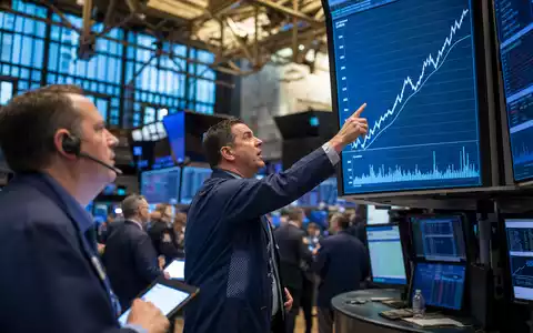 FedEx Corp. Börsensaal NYSE US31428X1063 mit Händlern vor Logistik Sektor Charts im Editorial Presse Stil - Foto: THN
