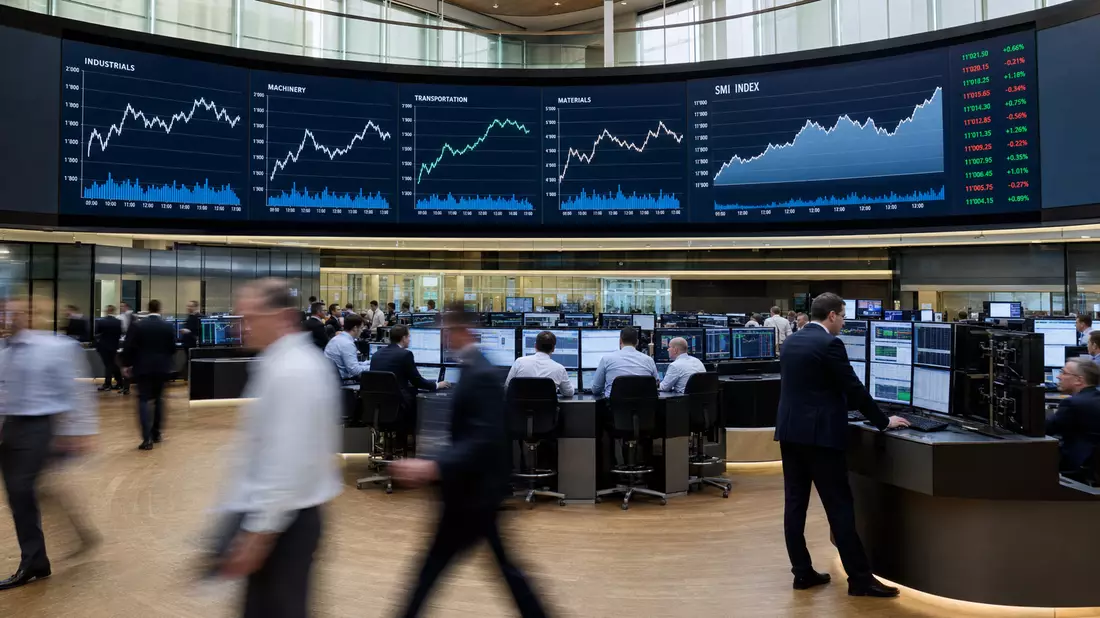 Handelssaal mit Bildschirmen für Industrie-Charts und SMI-Index-Kurve