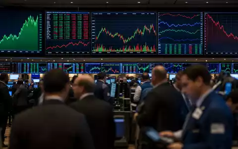 Börsen-Editorial mit Trading-Floor und Charts symbolisiert Handel der Aktie PG&E Corporation, ISIN US69331C1080 - Foto: THN