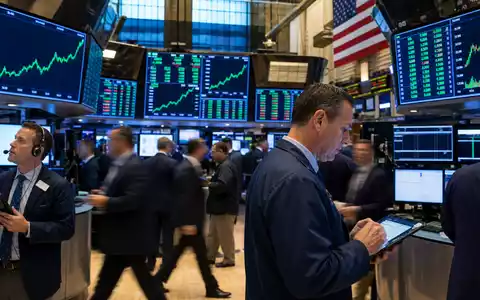 Börsen-Editorial vom Trading-Floor mit Kursdiagrammen visualisiert McCormick & Company (ISIN US5797802064) an der NYSE - Foto: THN