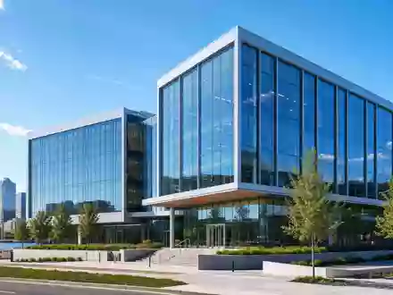 Architektur-Render eines Bürogebäudes repräsentiert Rockwell Automation ISIN US7739031091 mit moderner Glasfassade in Milwaukee - Foto: THN