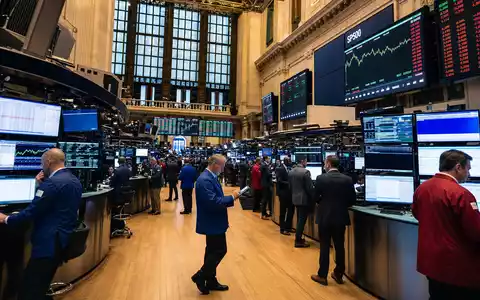Franklin Resources US3546131018 NYSE Börsensaal mit Händlern SP500-Charts und dramatischer Hallenbeleuchtung im Editorial-Stil - Foto: THN