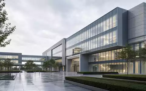Renishaw plc (GB0007365546) betreibt weltweit moderne Technologiestandorte, symbolisiert durch dieses zeitgenössische Architektur-Render eines Firmengebäudes - Foto: THN