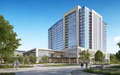 Welltower Inc. (US95040Q1040) entwickelt hochwertige Gesundheitsimmobilien, hier visualisiert als modernes, glänzendes Architektur-Render bei Tageslicht - Foto: THN