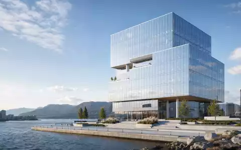 Storebrand ASA NO0003053605 visualisiert ein futuristisches Hochhaus-Rendering für den nordischen Finanzdienstleistungssektor am Wasser - Foto: THN