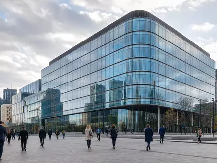 NN Group N.V. (ISIN NL0010773842) betreibt moderne Bürotürme in Den Haag mit gläserner Fassade - Foto: THN