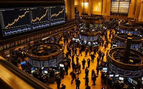 EOG Resources US26875P1012 NYSE Börsensaal mit Tradern und Energiesektor-Kurscharts auf großen Bildschirmen - Foto: THN