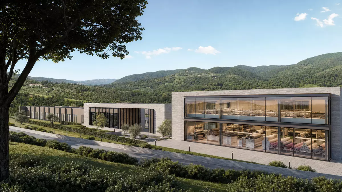 Architektur-Render einer modernen Textilfabrik inmitten grüner Hügel