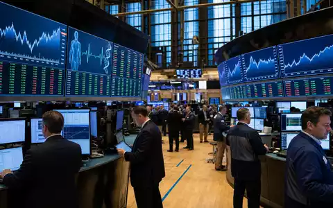 Zimmer Biomet US98956P1021 zeigt Börsen-Editorial vom Trading-Floor mit Charts der Medizintechnik-Branche auf Bildschirmen - Foto: THN