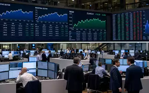 Schaeffler AG (DE000SHA0100) notiert im MDAX, dargestellt durch redaktionelles Foto der Frankfurter Börse mit Sektor-Aktiencharts - Foto: THN