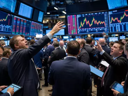 Editorial-Aufnahme eines Börsenparketts mit Charts symbolisiert Handelsaktivität rund um T. Rowe Price Group, ISIN US74144T1088 - Foto: THN