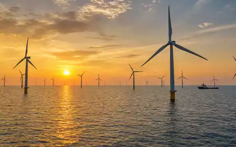 Fotorealistisches Bild zeigt Offshore-Windpark der Iberdrola S.A. (ISIN ES0144580Y14) mit modernen Windturbinen im Meer - Foto: THN
