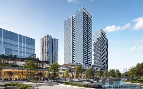 Allreal Holding AG (CH0008837566) zeigt einen Architektur-Render moderner Hochhäuser mit Glasfassaden und begrünter Plaza - Foto: THN
