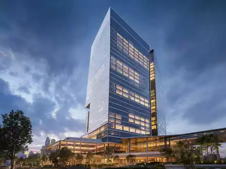 Capital One Financial Konzernhochhaus – Architektur-Render im Zwielicht mit Glasfassade, ISIN US1381731035 - Foto: THN