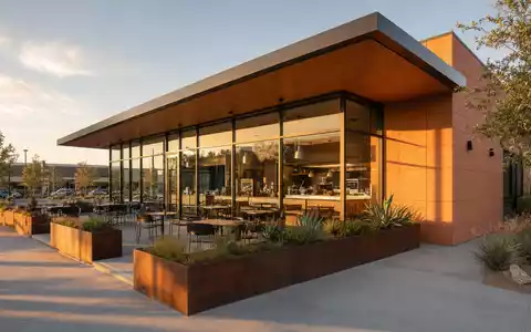 Chipotle Mexican Grill modernes RestaurantgebĂ€ude Render zeigt Glasfassade und AuĂenterrasse bei goldenem Abendlicht US1696561059 - Foto: THN