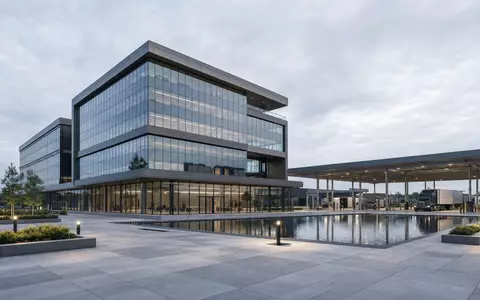 Architektur-Render zeigt modernen Firmensitz mit Tankstellen-Testanlage, passend zu Vontier Corp US92886T1051 und dessen Industrietechnologie - Foto: THN