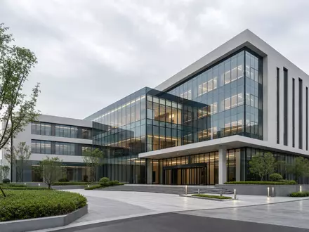 Vulcan Materials US9291601097 präsentiert Architektur-Render einer gläsernen unbeschrifteten Firmenzentrale mit gepflegten Außenanlagen bei bewölktem Tageslicht - Foto: THN
