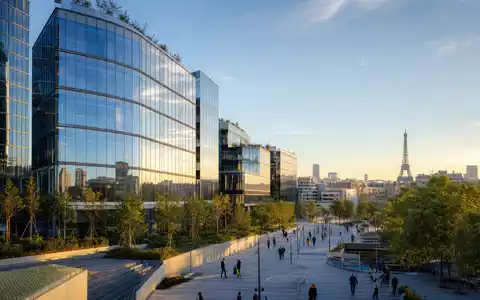 Fotorealistisches Bürogebäude in Paris zeigt Gecina SA FR0010040865 als führenden französischen Büroimmobilien-REIT am Abendlicht - Foto: THN