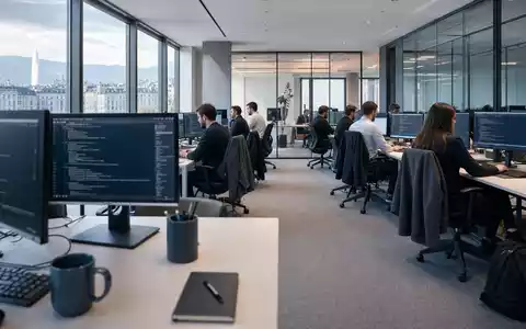 Temenos AG (CH0012453913) zeigt modernes Bürogebäude in fotorealistischer Darstellung bei Tageslicht mit Menschen im Vordergrund - Foto: THN