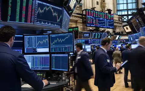 Emerson Electric NYSE-Handelsplatz US2910111044 mit EMR-Ticker-Anzeige und industriellen Sektor-Charts auf HĂ€ndler Monitoren - Foto: THN
