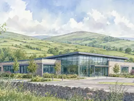 Aquarellmalerei einer irischen Hügellandschaft mit Bürogebäude repräsentiert Kingspan Group plc, ISIN IE0004927939, ruhig dargestellt - Foto: THN