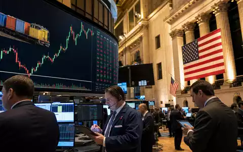 Börsen-Editorialfoto vom NYSE-Handelssaal mit Güterzug-Chart repräsentiert Union Pacific Corp, ISIN US9078181084, an der Börse - Foto: THN