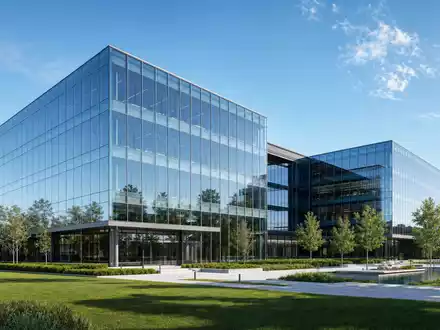 Texas Instruments (US8825081040) zeigt ein Architektur-Render einer modernen Glas-Firmenzentrale mit begrĂŒnter Campus-Umgebung am Tag - Foto: THN