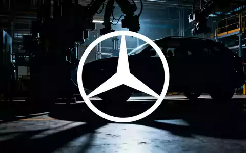 Eine abstrakte, atmosphärische Industrieszene, die den Automobilsektor darstellt, mit langen Schatten, die längere Arbeitszeiten symbolisieren. - Foto: über boerse-global.de