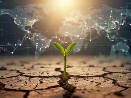 Eine einzelne grüne Pflanze wächst aus trockener Erde, symbolisiert nachhaltiges Wachstum und Investitionen. - Foto: über boerse-global.de