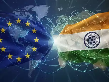 EU- und Indien-Flaggen-Grafik mit konvergierenden Linien, die Handel und Technologie symbolisieren und das Freihandelsabkommen repräsentieren. - Foto: über boerse-global.de